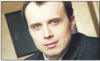 Michał Grzybowski | dyrektor w Ernst & Young